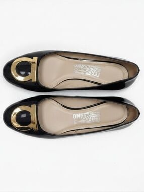 Salvatore Ferragamo Black Flats with Gold Logo